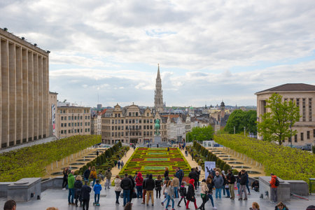 Tourists in scene of Brussels city from Kunstberg or Mount of the Arts.