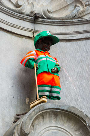 Brussels, Belgium - April 22, 2017: Manneken Pis - Little man Pee or le Petit Julien, a landmark small bronze sculpture in Brussels, Belgiumのeditorial素材