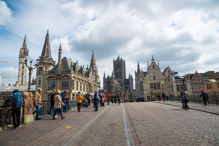 Ghent, Belgium - April 16, 2017: The Sint Michielsbrug bridge - the landmarks of Ghent, such as medieval mansions, St Nicholas Church and Belfort van Gent, Belgium.のeditorial素材