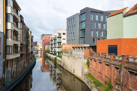 Ghent, Belgium - April 16, 2017: View of the beautiful canal and boats of Ghent, Belgiumのeditorial素材