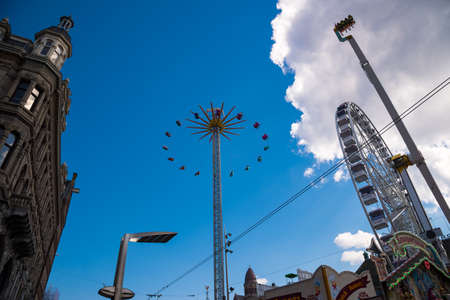 Amsterdam, Netherlands - April 19, 2017: Amusement Park Downtown Colorful Illuminated Day View Damrak Squareのeditorial素材