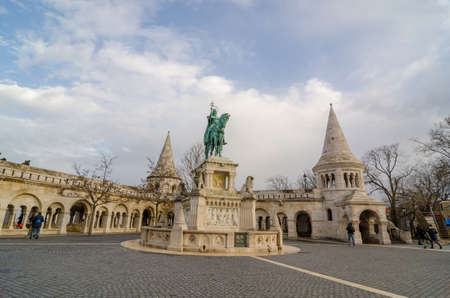 BUDAPEST, HUNGARY - FEBRUARY 23, 2016: Bronze statue of Stephen I of Hungary mounted on a horse at Fisherman's Bastion terrace, the Castle hill in Budapest, Hungary.のeditorial素材