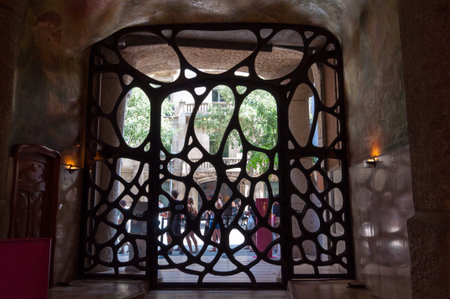 Spain, Barcelona Casa Mila, 03/15/2015, Antoni Gaudi metal door art at Casa Mila, La Pedrera