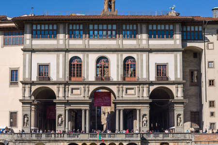 FLORENCE, ITALY - APRIL 14, 2013: The southern side of the museum Uffizi Gallery at the end of the square known as the Strada delle Magistrature. Florence, Tuscany, Italy.のeditorial素材