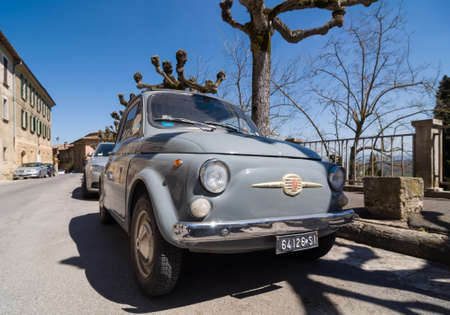 MONTEPULCIANO, ITALY - APRIL 15, 2013: Vintage car Fiat 500 on street in Montepulciano, Italyのeditorial素材