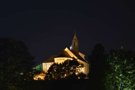 A church on the top of a hill in Warsaw New Townの写真素材