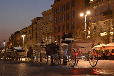 Horse carriages on Krakow Market Squareのeditorial素材