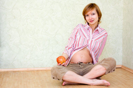 pregnant woman with red apple
