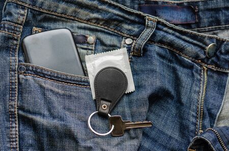Contents of a pocket of teenage jeans. Close-up. Selective focus. Without people.の写真素材