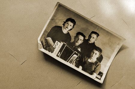 Photo 1940-1943 Black and white portrait in memory of two couples. Two men in uniform. Photo World War II. Before sending to the front.の写真素材