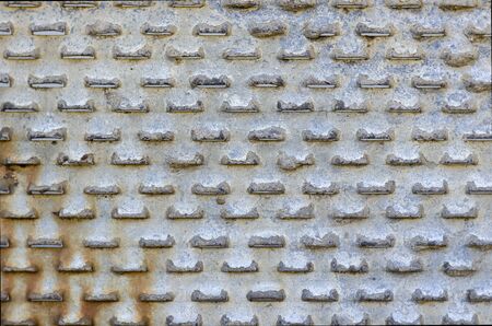 Old perforated metal close-up. Rusty Sheet Metal. Abstract background. Select a focus.の写真素材