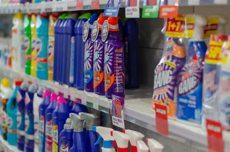 Nikolaev, Ukraine - May 08, 2020: Assortment of household chemicals on a store shelf with price tags.Clogging aid in sewer pipes. Empty space on the counter with sold out promotional goods. Selective focus.のeditorial素材