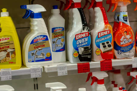Nikolaev, Ukraine - May 08, 2020: Assortment of cleaning products for the bathroom and kitchen with price tags. The inscriptions in Ukrainian and Russian describe the product and cost. Red sale price tags.のeditorial素材