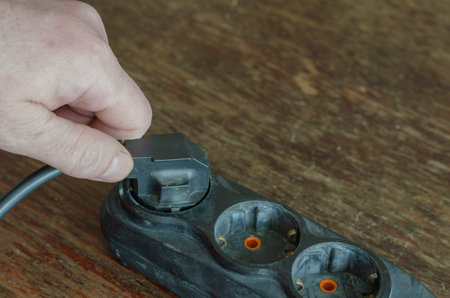 Incorrect disconnection of the electrical plug from the extension cord. Incorrect hold of the...