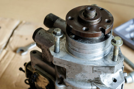 High pressure diesel fuel pump. Drive shaft with a pulley of the fuel pump. Car service. Selective...