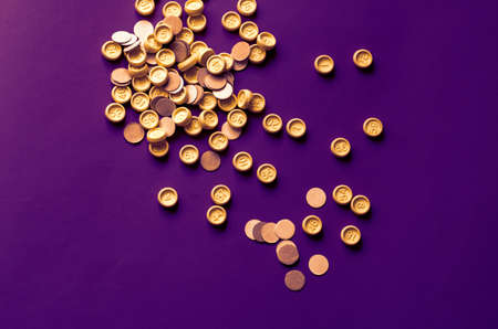 Bingo game plastic chips on blue background. Chips with numbers and paper circles.の写真素材