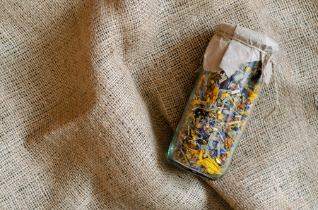Herbal and alternative medicine concept. Drinks based on medicinal herbs and flowers. Dried Flower...