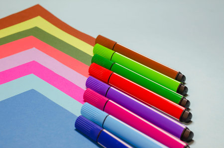 Creative geometric composition with colorful felt-tip pens and colored paper. Concept of harmony in creativity. Selective focus. No People.の写真素材