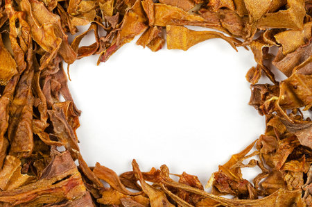 Natural treats for pets. Dried cow udder with the blank white area. Full frame of dried treat pieces...