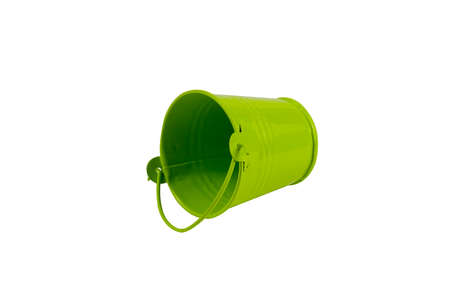 Empty green metal bucket on a white background. An bucket with a handle. Isolated.の写真素材