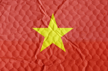 The flag of Vietnam on an uneven textured surface. The concept of freedom, independence of the nation.の写真素材