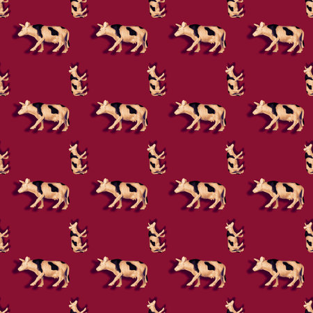 Composition with Repeating figurine of a cow on a colored background. Black and white spotted...
