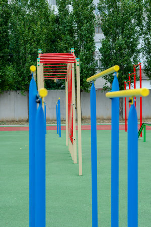 Sports ground with a variety of horizontal bars. Open area for sports in the city park. Horizontal...