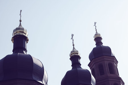 Silhouette of the Church of the Holy Spirit against a clear blue sky. Modern Ukrainian Christian...