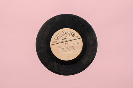 An old sound recording from the '70s. Songs by Yuri Antonov. Musical single of the famous Soviet singer. Recording studio "Melody", 1973, USSR. Odessa, Ukraine - 04 26 2021.のeditorial素材