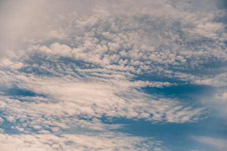 Pink clouds in the blue sky. A beautiful evening sky. abstract background. summer landscape.