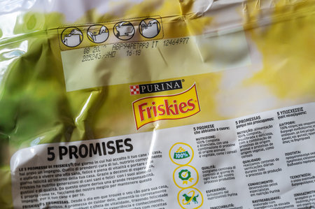 Close-up of dog food packaging. Purina Friskies. Purina, is an American subsidiary of NestlÃ©, based in St. Louis, Missouri. It produces and markets pet food, treats. Ukraine, Mykolayiv - 05 25 2022 Pのeditorial素材