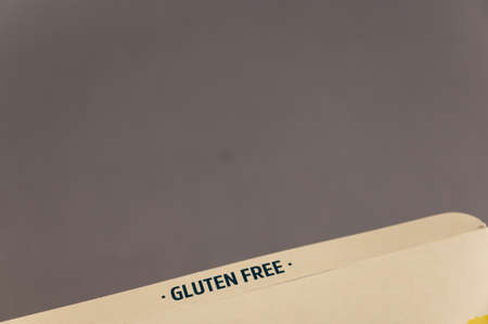 Gluten free. The inscription on the end of the cardboard box. Healthy Food Concept. close-up. selective focus.の写真素材