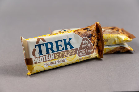 Three TREK Protein Energy Bars. A gluten-free, sugar-free snack. Products of the British company Natural Balance Foods. Healthy Foods. Ukraine, Mykolaiv - 06 22 2022のeditorial素材