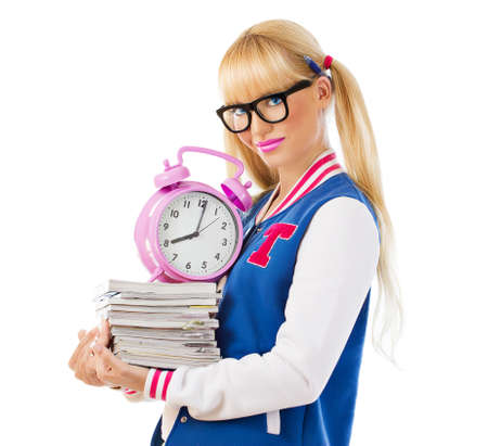 University girl holding books and smiling on white backgroundの写真素材