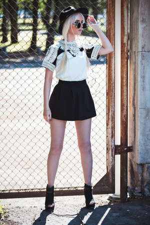 Beautiful blonde model in posing outdoorsの写真素材
