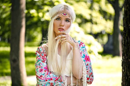 Beautiful blonde model in posing outdoorsの写真素材