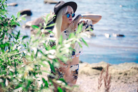 Beautiful blonde model in posing outdoorsの写真素材