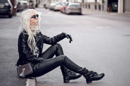 Beautiful blonde model posing outdoorsの写真素材