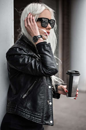 Beautiful blonde model posing outdoorsの写真素材