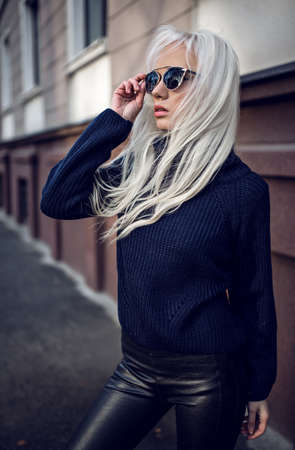 Beautiful blonde model posing outdoorsの写真素材
