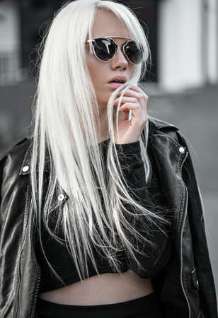 Portrait of young blonde model outdoorsの写真素材