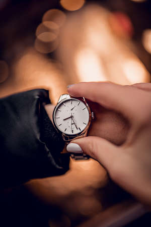 Stylish silver watch on woman handの写真素材