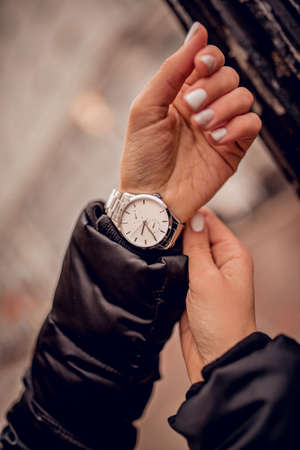 Stylish silver watch on woman handの写真素材