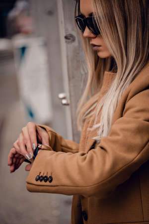 Stylish beautiful woman posing in outdoorの写真素材