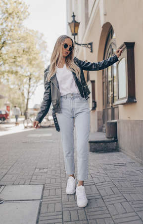 Stylish woman posing in outdoorの写真素材