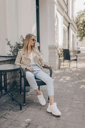 Stylish woman posing in outdoorの写真素材