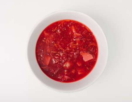 Cold beetroot soup isolated on white backgroundの写真素材