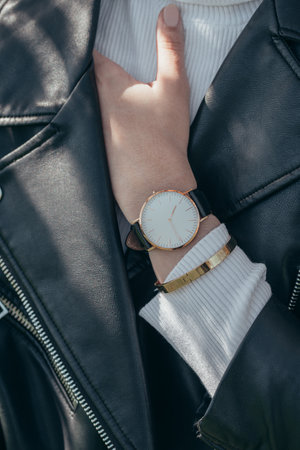 Stylish white watch on woman handの写真素材