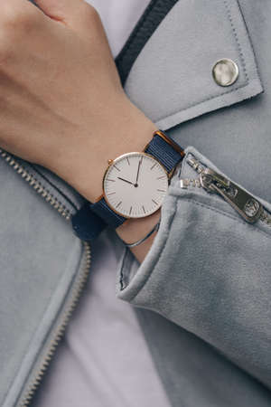 Stylish white watch on woman handの写真素材