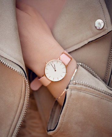 Stylish white watch on woman hand.の写真素材